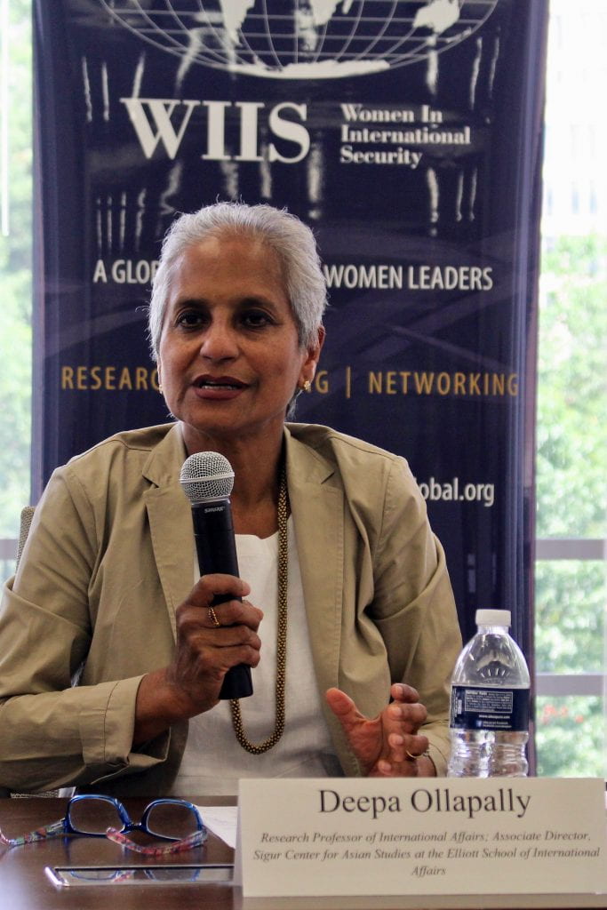 Photo of Deepa Ollapally speaking at WIIS Panel
